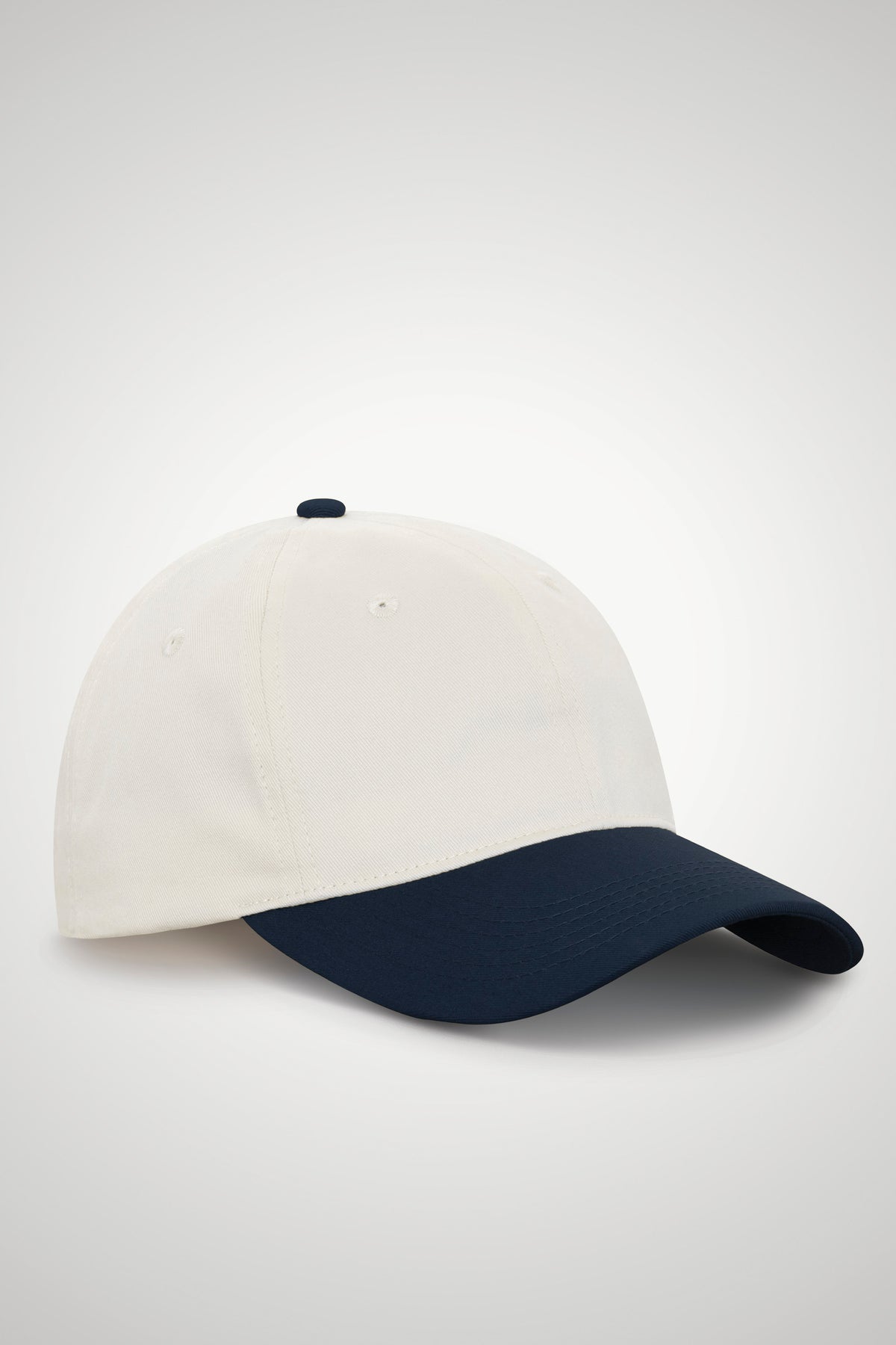 KOI CASQUETTE À BOUTONS-PRESSION NON STRUCTURÉE BICOLORE. KOI1830